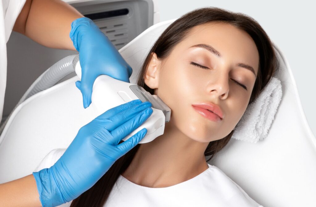 An adult relaxes as they get a quick IPL treatment.