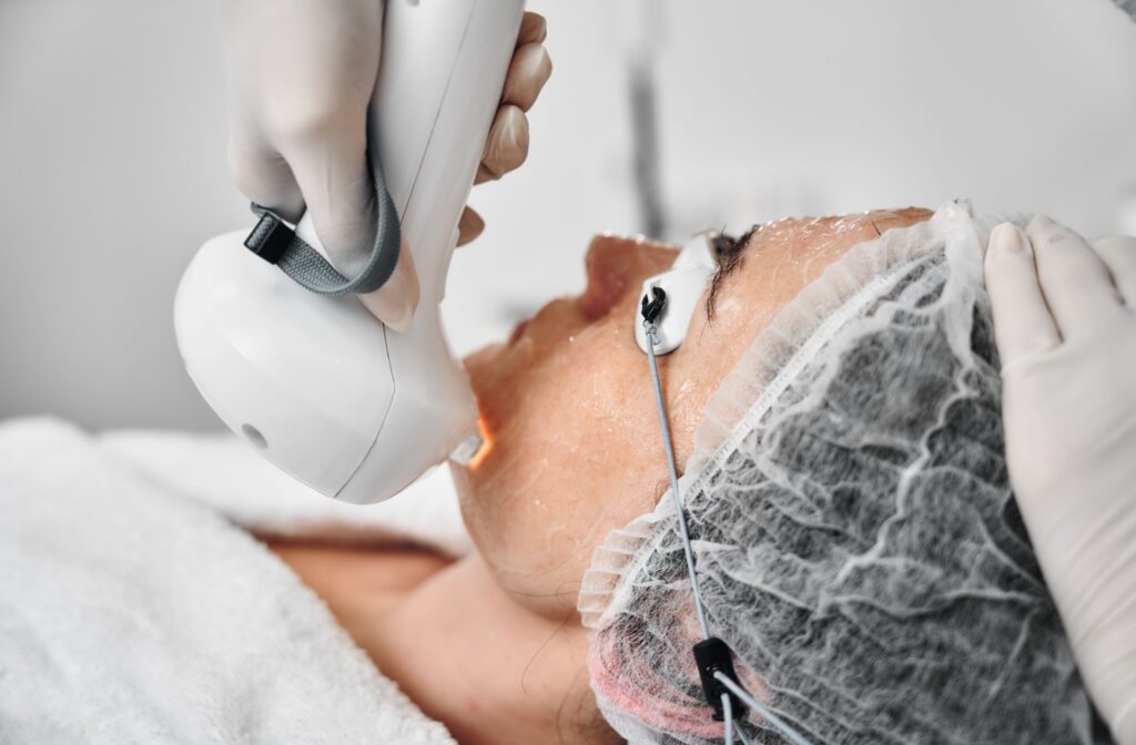 A person with cooling gel on their skin getting a comprehensive IPL treatment.